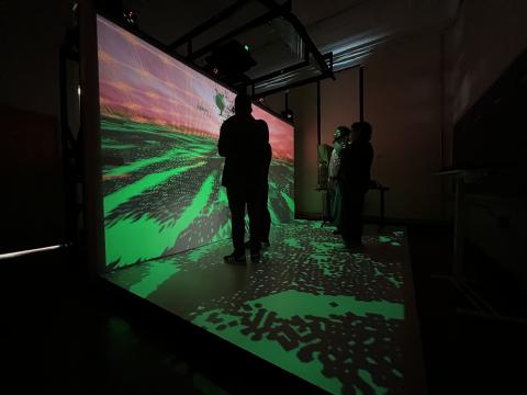 People viewing a virtual reality environment in the CAVE