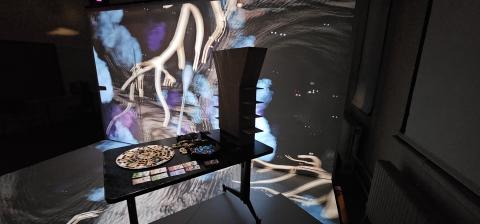 hybrid tabletop and CAVE game